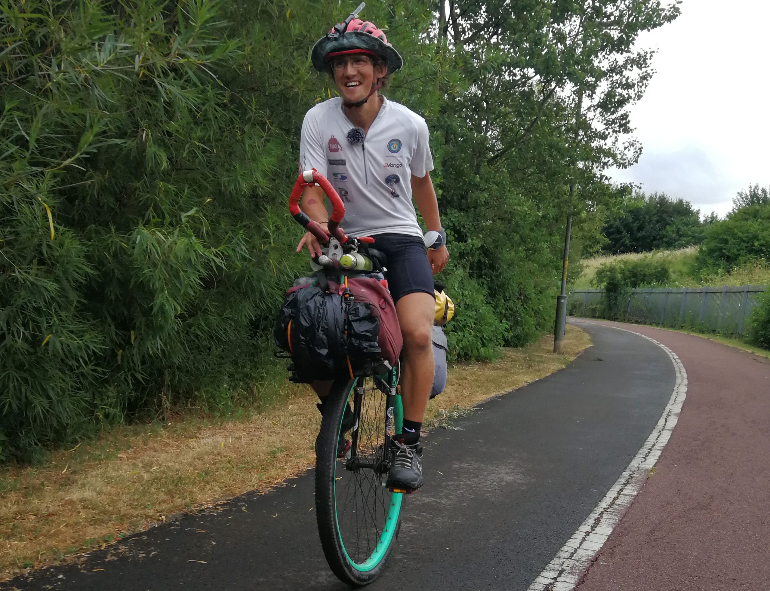 Ed riding unicycle